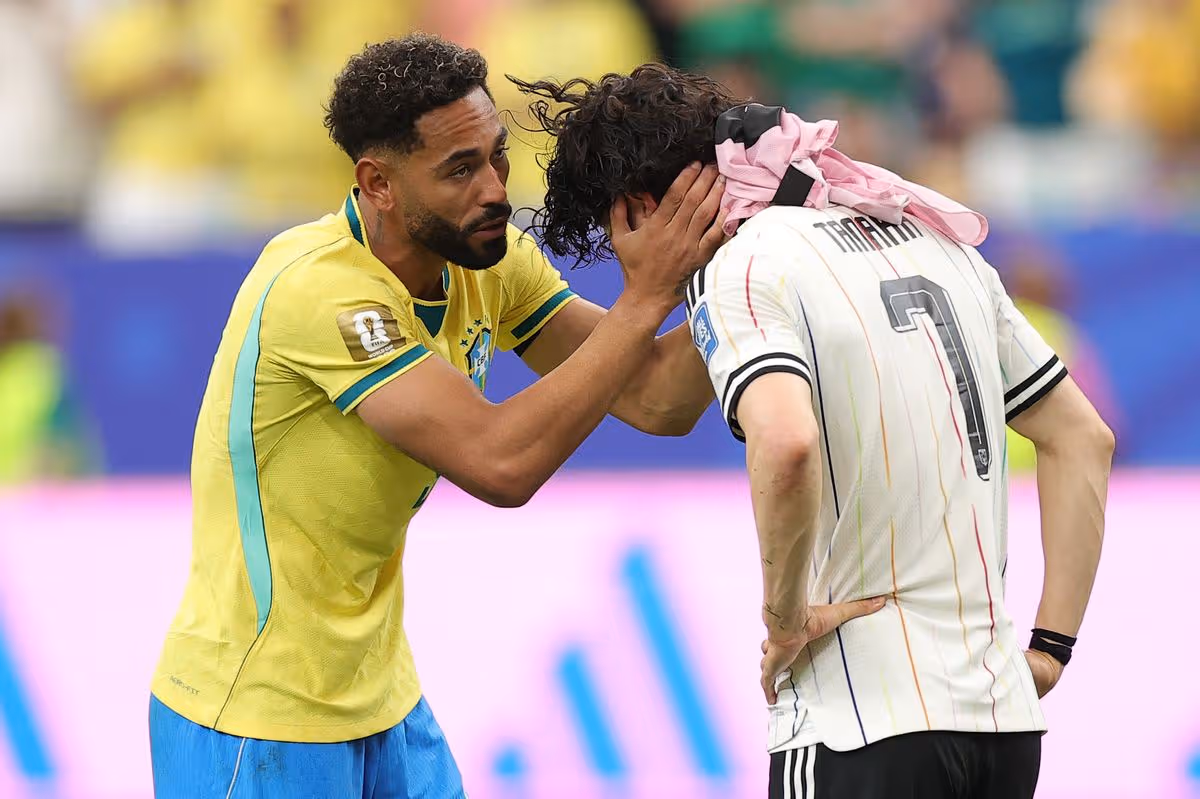 Matheus Cunha and Ao Tanaka on the pitch