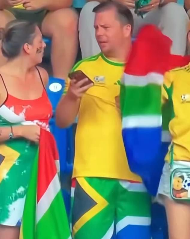 EXCLUSIVE: Expert lip reader reveals what really happened between THAT World Cup couple caught on camera… after tense exchange went viral