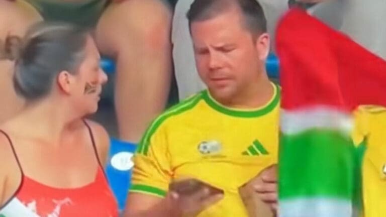 After Couple’s Viral World Cup Moment Had Fans Urging Her To Divorce Him, Expert Lip Reader Reveals What They Really Said
