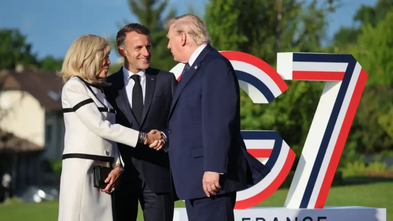Donald Trump’s whisperings to Brigitte Macron revealed by lip reader after ‘weird’ handshake