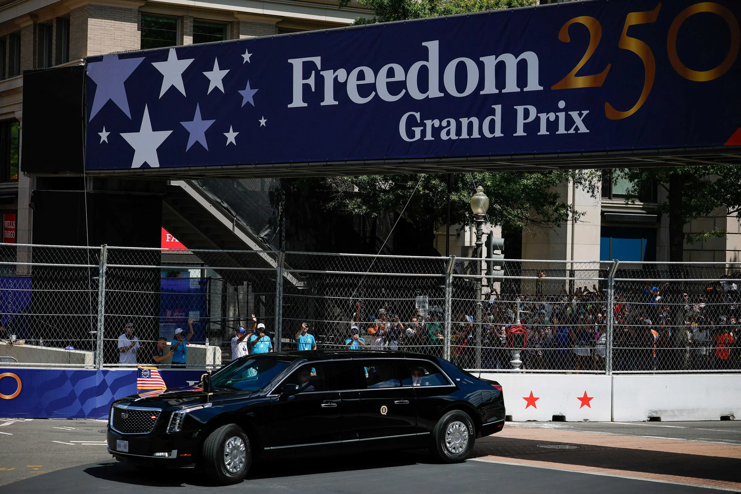 U.S. President Donald Trump rides in the presidential limousine